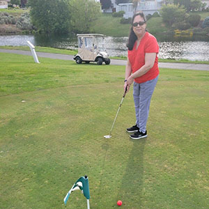 Asha golfing