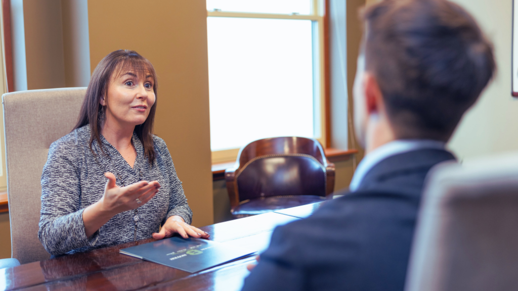 Tori Anguiano meeting with client