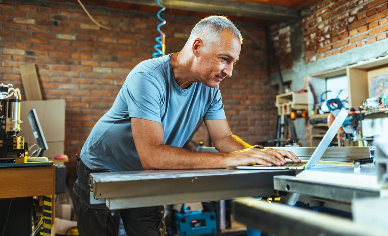 Contractor working on laptop