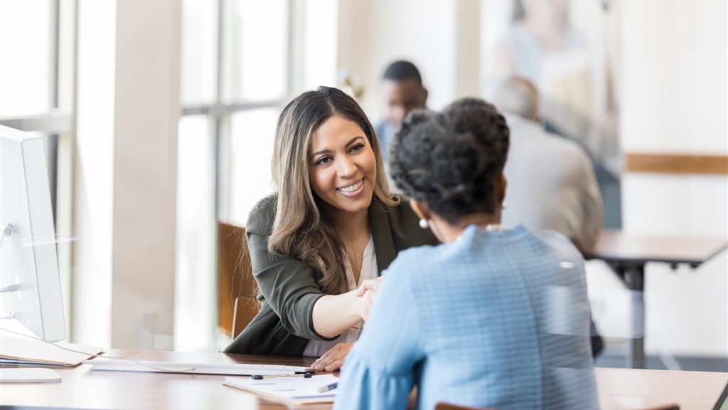female business owner meeting with lender