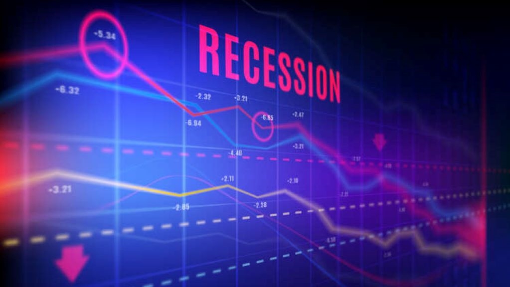 graphs on digital screen with word "recession"