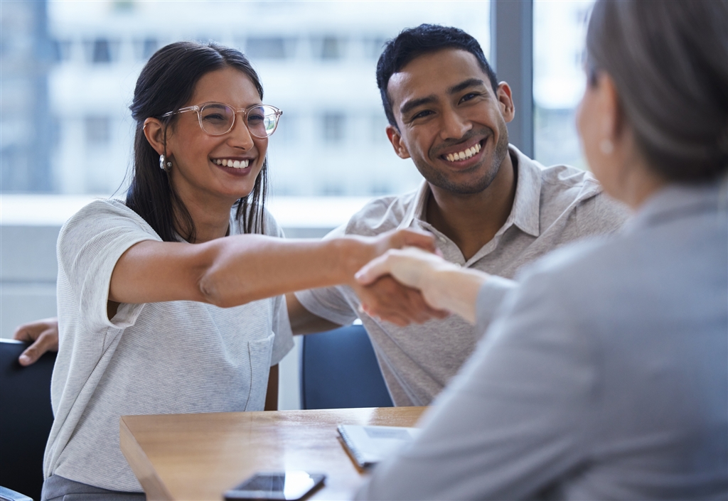 successful business loan advisor meeting with client