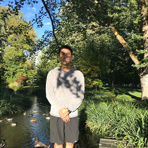 Ivan outside in front of water