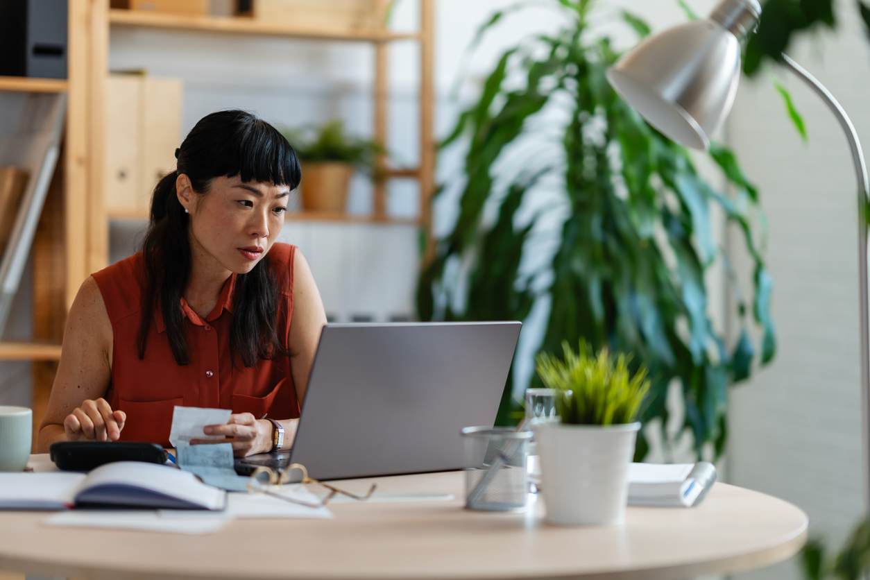 Woman looking at a laptop