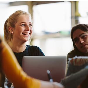 Girl smiling with laptop