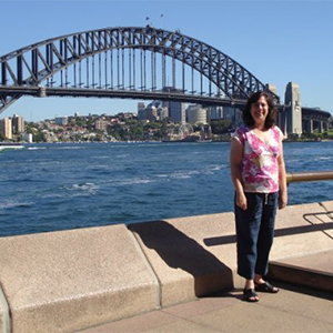 Asha in front of bridge