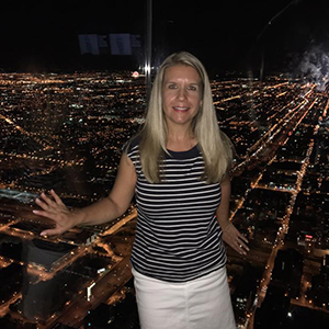 Becky in front of dark skyline