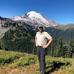 Brad in front of Mountain