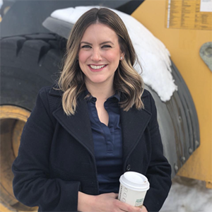 Jessica smiling at Yakima Building construction site