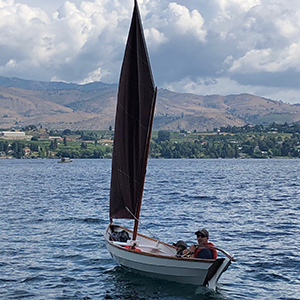 John on a boat in the water