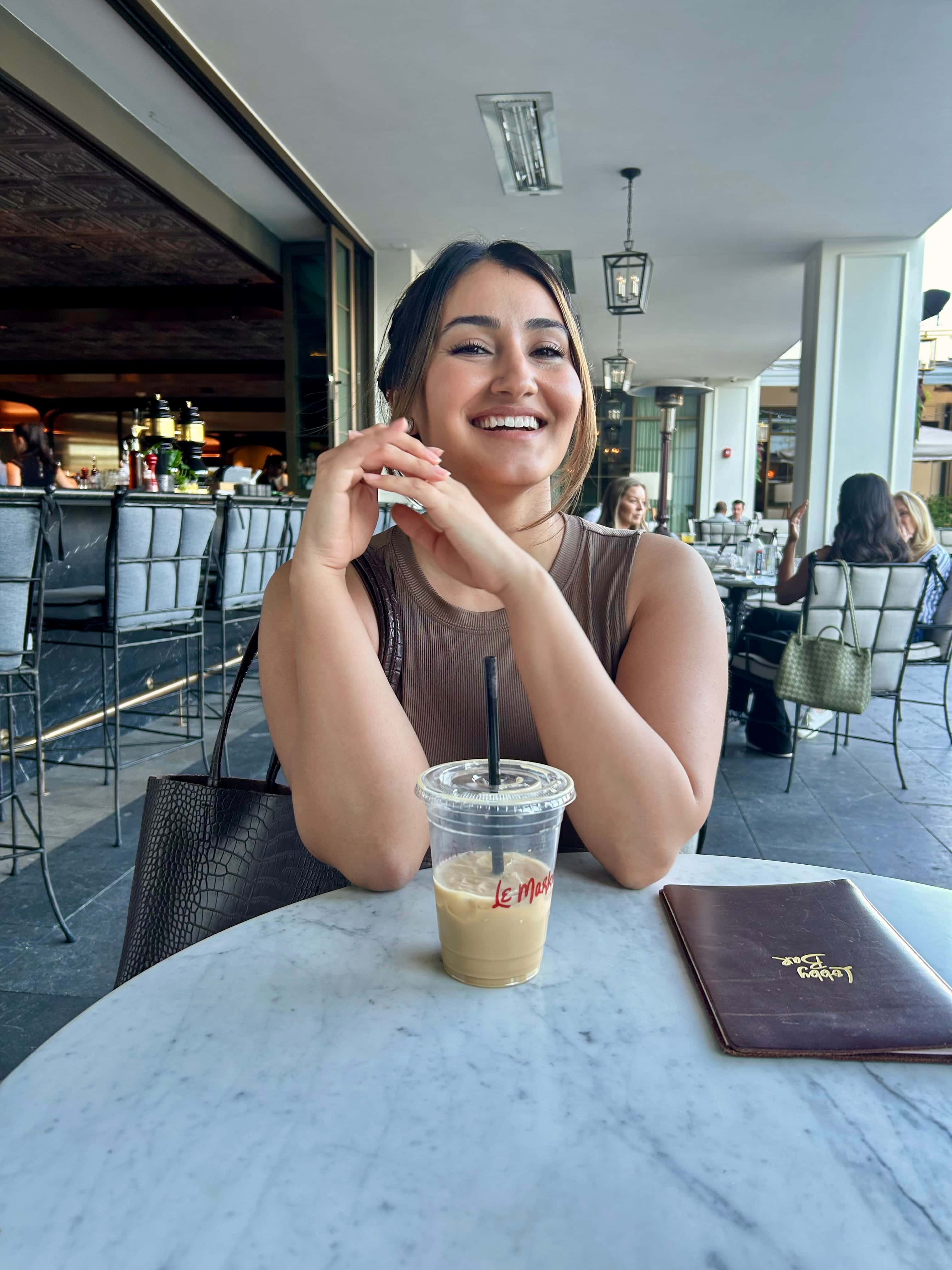 Marlena Ramirez sitting at a table
