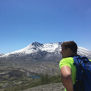 Stuart in front of mountain