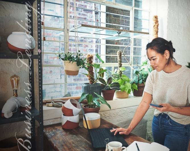 Young female business owner in retail shop