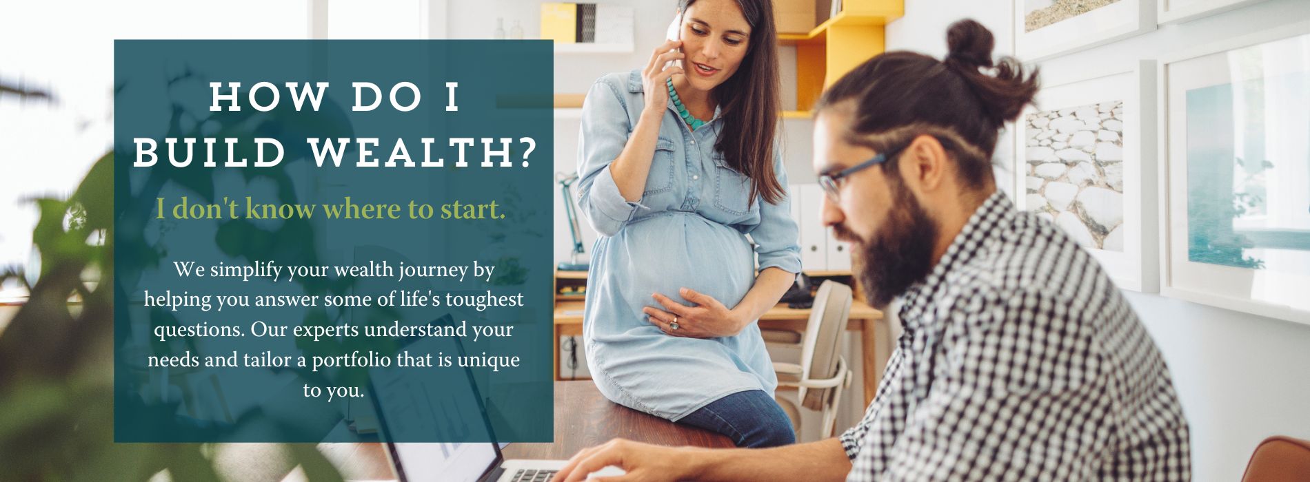 Man and pregnant wife in home making financial decisions