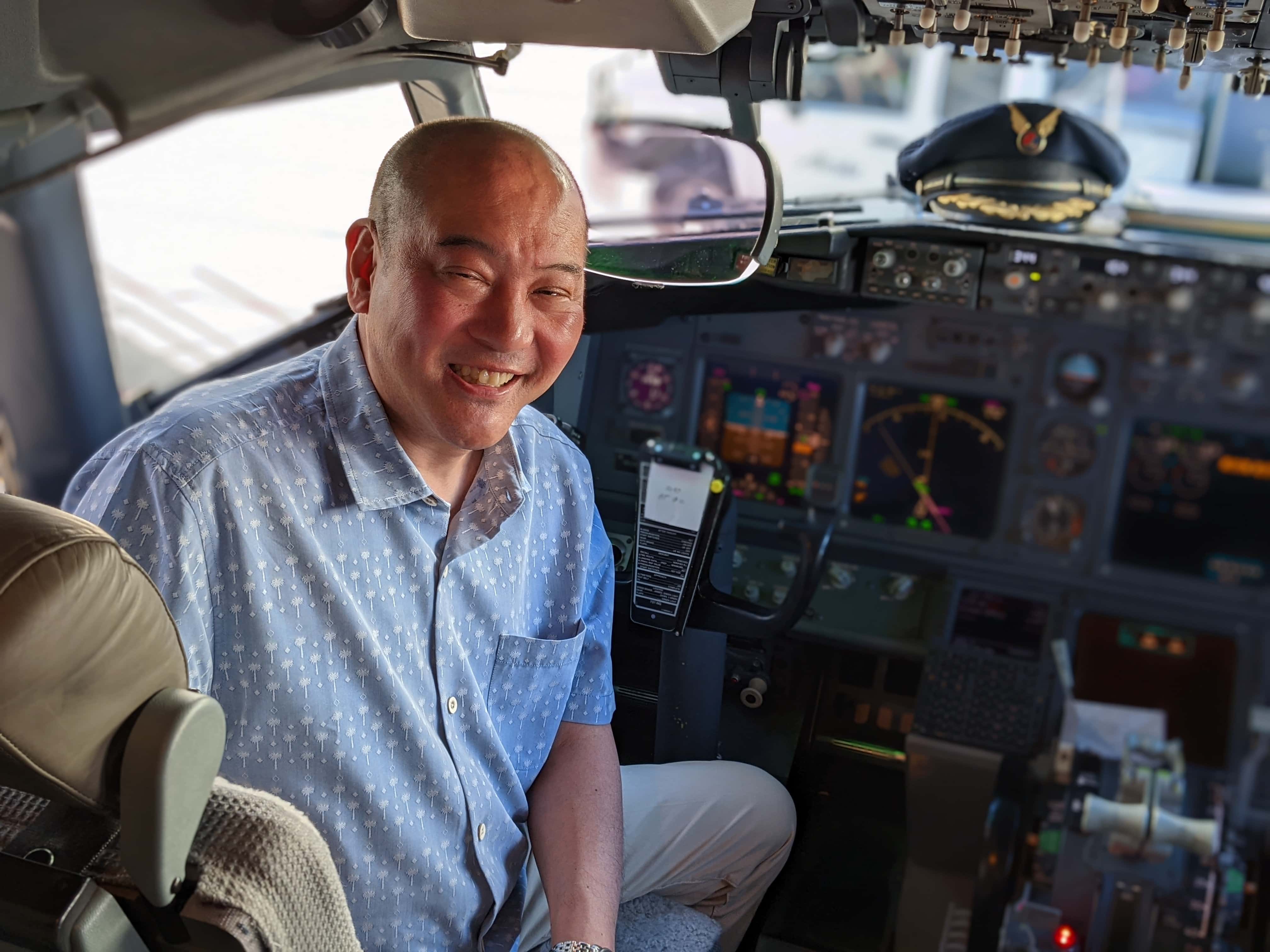 Mark Kajita sitting in cockpit