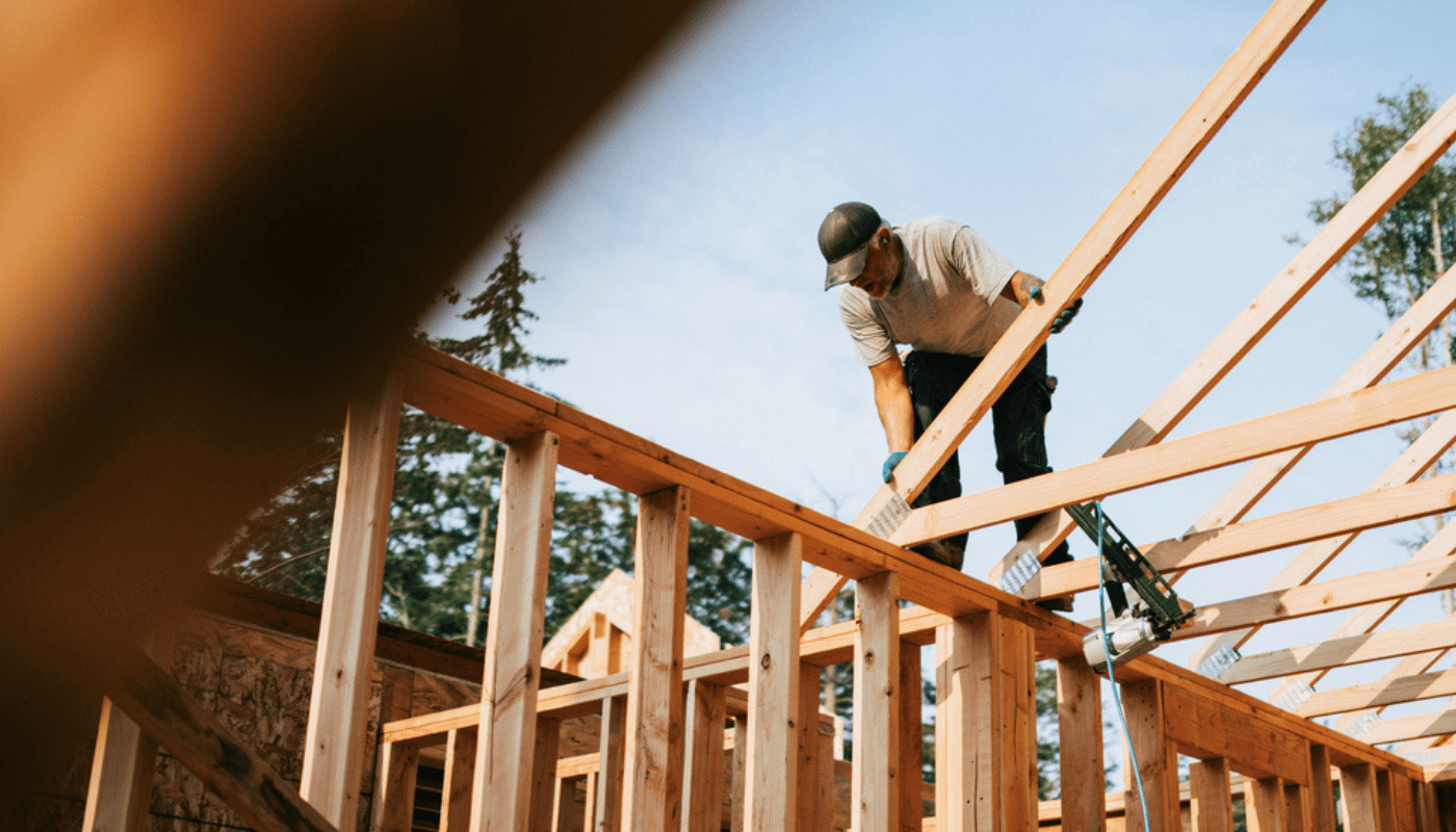 Builder working on framing a new home